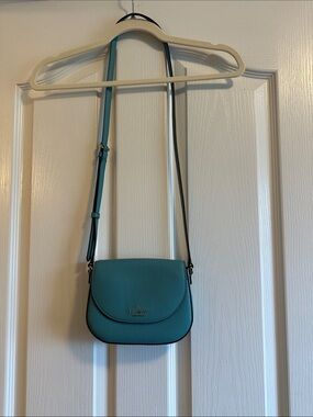 kate spade teal pebbled leather crossbody saddle bag
